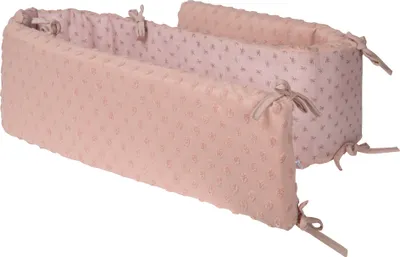 Two pink crib bumpers are shown side-by-side against a white background.