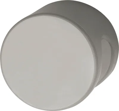 A close-up, angled view of a gray, round doorknob against a white background.