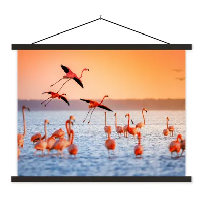 Produktbild von MuchoWow® Textilposter Vogel - Flamingo - Wasser - Sonnenuntergang - Rosa 150x113 cm mit holzfarbenen Rahmen - Poster