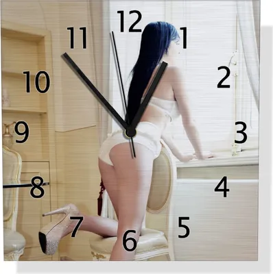 Produktbild von Wallario Design Wanduhr Sexy Dessous - Junge Frau mit eleganten Beinen am Fenster aus Aluverbund, Größe 30 x 30 cm
