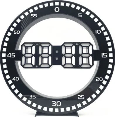 A digital clock with a circular frame and LED display.