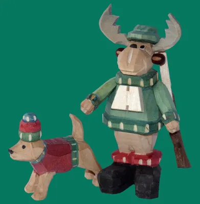 Produktbild von Holzfigur Hund mit Mütze geschnitzt Höhe 9cm NEU