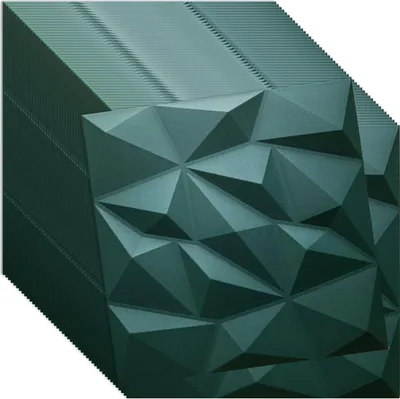 A stack of dark green 3D wall panels with a geometric, faceted design.
