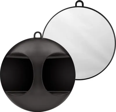 A black handheld mirror with two openings and a white reflective surface behind it.