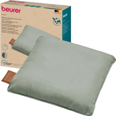 A Beurer massage cushion with heat function is shown in front of its packaging.