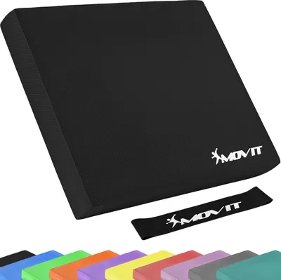 A black balance pad with a logo and a separate black band with the same logo.
