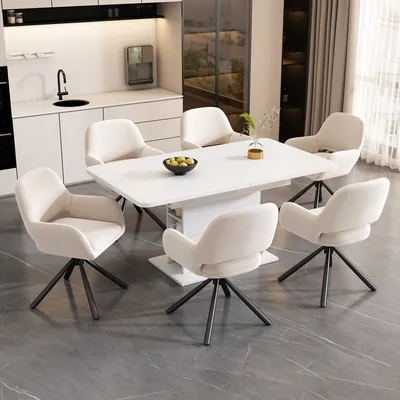 A dining set with a white table and six beige chairs in a modern kitchen.