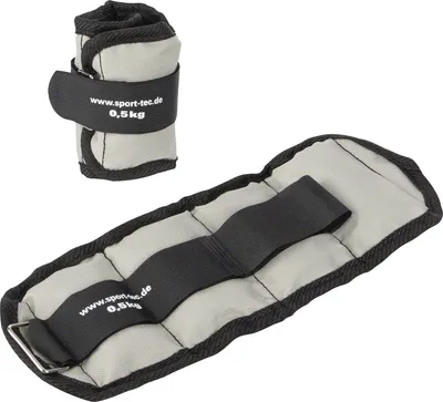 Two ankle weights are shown against a white background. One is rolled up and the other is laid flat.