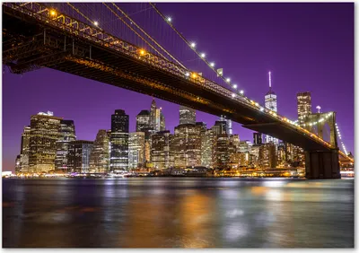 Produktbild von Tulup® Glas-Bild - 100 x 70 - Wandbild aus Glas - Wandkunst - Wandbild hinter gehärtetem Sicherheitsglas - Sehenswürdigkeiten & Architektur - Manhattan bei Nacht - Lila