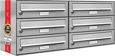 A set of six stainless steel mailboxes mounted together.