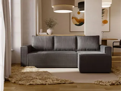 Ecksofa in L-Form mit Schlaffunktion und Bettkasten, aufgestellt in einem modernen Wohnzimmer