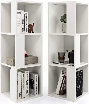 Two white cube-shaped bookshelves are displayed side-by-side, filled with various decorative items and books.