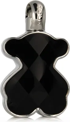 A close-up studio shot of a black onyx bear pendant with a silver bail.