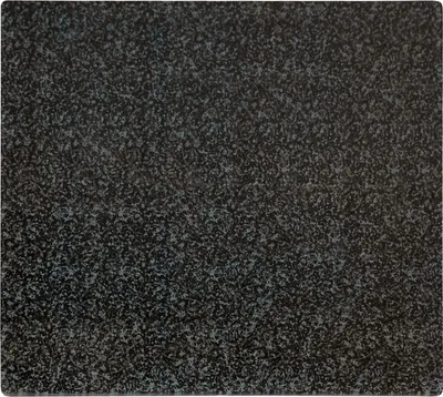 A close-up view of a speckled black surface, resembling granite.