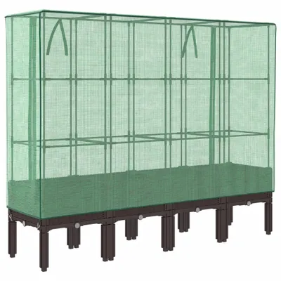 A raised garden bed with a greenhouse cover.