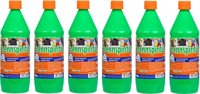 Six bottles of cleaning fluid lined up against a white background.