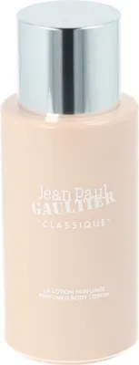 A close-up studio shot of a Jean Paul Gaultier Classique Perfumed Body Lotion bottle.
