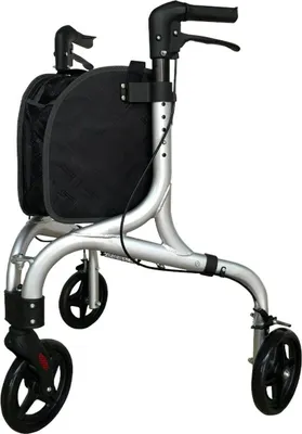 A silver and black three-wheeled walker with a black bag attached.