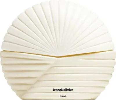 A white perfume bottle with a shell-like design.