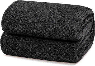 Immagine prodotto di Coperta in pile, dimensioni 230x270 cm, colore nero, motivo a nido d'ape, realizzata in microfibra e flanella, ideale per la televisione