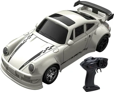 A white remote control drift car with black racing stripes and a black remote control.