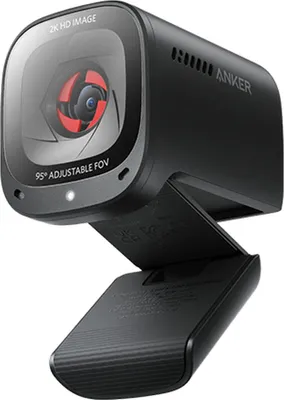 A black webcam with a stand, shown from a slightly elevated angle against a white background.