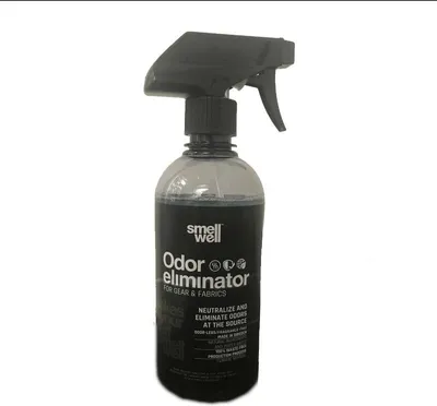 A bottle of SmellWell Odor Eliminator for gear and fabrics.