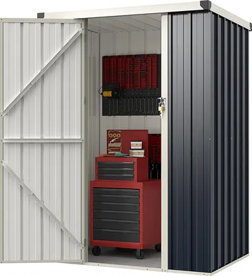 An open metal garden shed with storage units inside.
