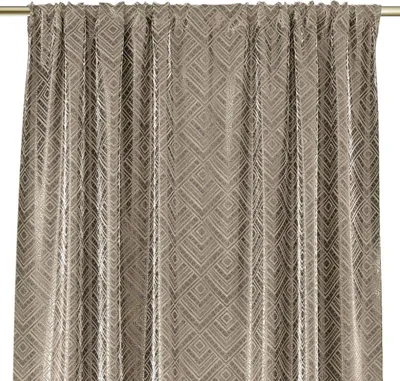 A close-up view of a cream-colored curtain with a geometric diamond pattern.