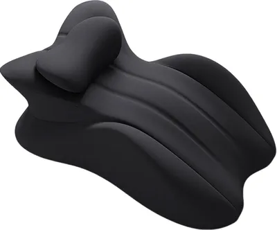 A black wedge-shaped pillow with a headrest, isolated on a white background.