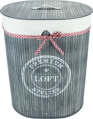 A laundry basket with a lid and a decorative ribbon.