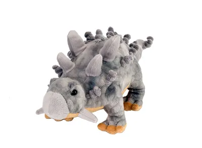 A plush toy dinosaur, an Ankylosaurus, is shown against a white background.