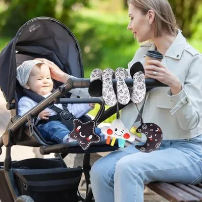 Produktbild von Aktivitätsspielzeug für Babybett und Autositz zur Frühförderung mit Rassel, visueller Stimulation, Sinnesanregung und Unterhaltung