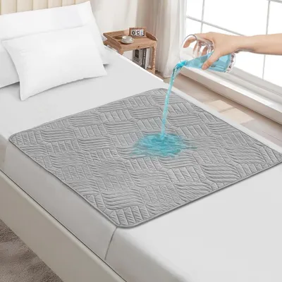 Image de Protection de matelas imperméable - Couche de protection lavable pour l'incontinence - 85 x 90 cm - Lot de 2