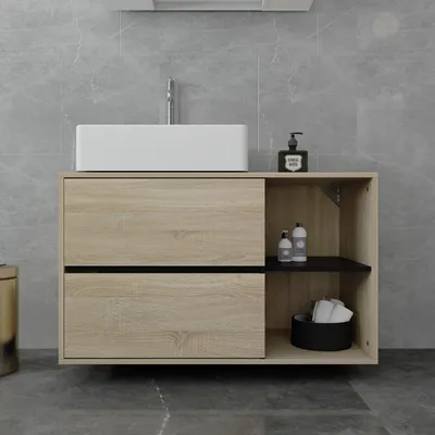 A modern bathroom vanity with a vessel sink and storage.