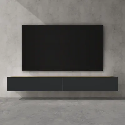 A modern, wall-mounted TV stand with a television mounted above it, set against a concrete wall.