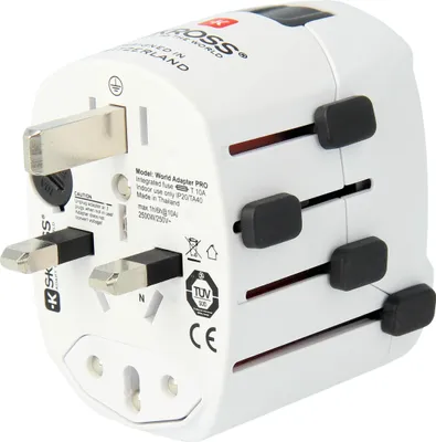 A white Skross PRO travel adapter with various plug types extended.