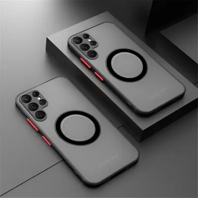 Two phone cases with magnetic rings are displayed on a dark, angled surface.