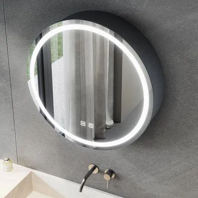 Imagen del producto de Espejo redondo para el baño con iluminación, enchufes y sistema anti-vaho