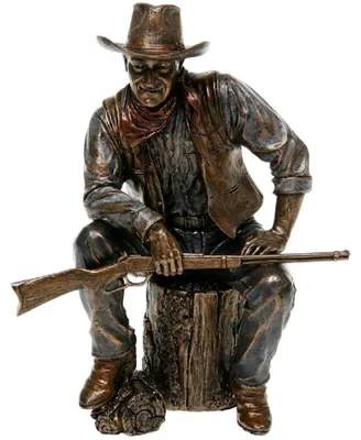 Bronze-Figur sitzend auf Baumstamm, 23 cm, Western-Stil