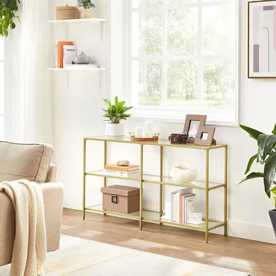 Productafbeelding van Console tafel Fredrick – Voor de hal – 3 etages – Bijzetter – Planken van gehard glas – 130 x 30 x 73 cm – Metalen frame – Modern – Geschikt voor hal, woonkamer en slaapkamer – Goudkleurig