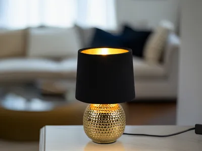 Produktbild von Reality Sophia Tischleuchte E14  ⌀16cm Goldfarbig Samtschirm Schwarz