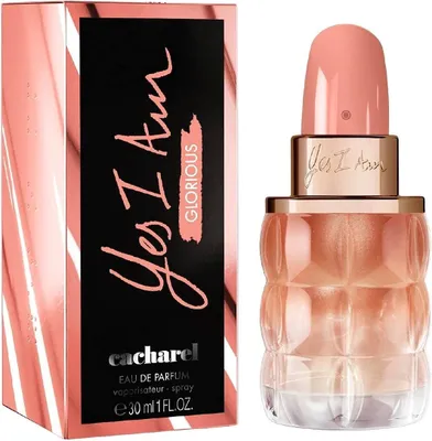 A perfume bottle and its packaging are displayed against a white background.
