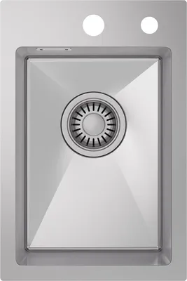 A top-down view of a stainless steel kitchen sink with a drain.