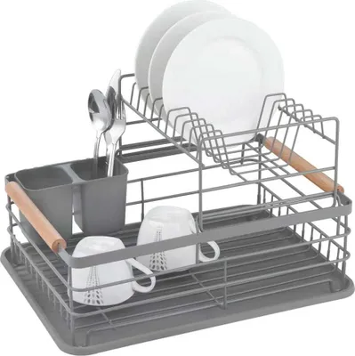 A dish drying rack with plates, cups, and cutlery.