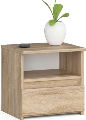 A wooden nightstand with a drawer and an open shelf, topped with a white vase containing a green plant and a remote control.