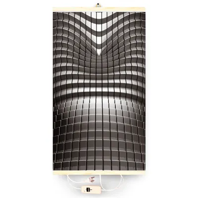 A vertical infrared heating panel with an abstract motif, suspended against a white background. The panel has a wooden frame at the top and bottom, and electrical cords with a switch and plug are visible at the bottom.