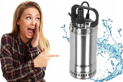 A woman is pointing and shouting towards a submersible pump with water splashing around it.