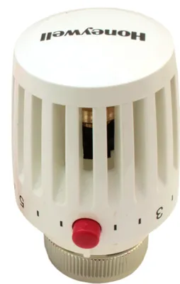 A white Honeywell thermostat head with a red button and markings for temperature settings.