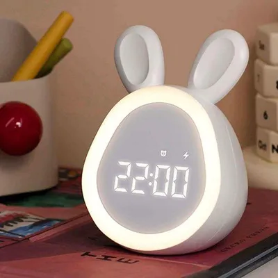 Immagine prodotto di Sveglia digitale a forma di coniglio con luce LED calda - Sveglia silenziosa - Funzione timer - Ricaricabile